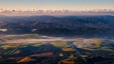 Panoramic colorful landscape of fields, meadows and mountains, High Tatras, Slovakia