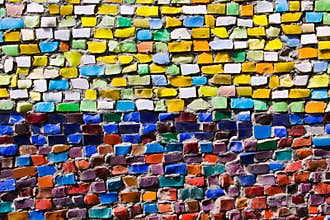 Horizontal colorful mosaic texture on wall