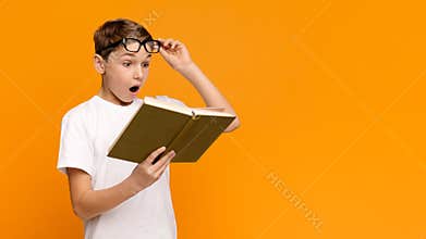 Emotional teenager reading bestseller science fiction book