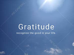 Inspirational quote - Gratitude, recognize the good in your life. With background of sunlight and bright & clean blue sky.