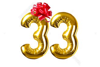 Happy 33 years old party with golden shiny inflatable balloons with red bow