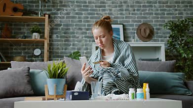 Unhealthy teenager using smartphone for video consultation with doctor talking