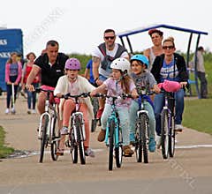 Family cycling day out group outdoor exercise
