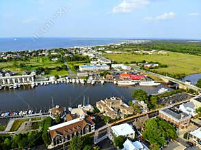 Lewes, Delaware, U.S.A - June 2, 2019 - The aerial view of the beach town, fishing port and waterfront residential homes along the