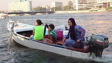 Nile River Cairo - Women drive boat in Nile River Cairo - Egypt