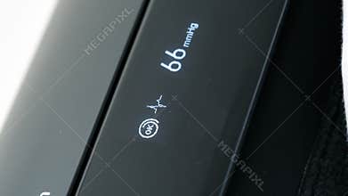 Time lapse fast motion measuring blood pressure with Omron Evolv Arm blood