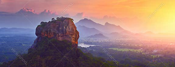 Panoramic view of famous ancient stone fortress Sigiriya Lion Rock on island of Sri Lanka.