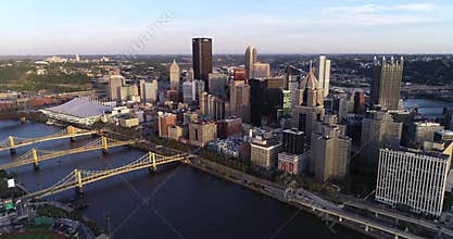 Pittsburgh Cityscape, Pennsylvania.  City is Famous because of the bridges. Sunset Light. Business Skyscrapers and Three Bridges