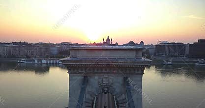 Budapest, Hungary - 4K drone flying up at famous Szechenyi Chain Bridge at sunrise