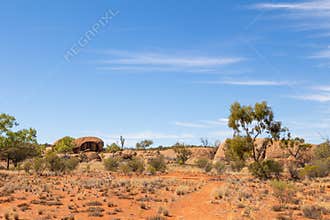 Granite boulders surrounded by drought resistant vegetation