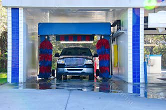 Automated car wash with a soapy truck
