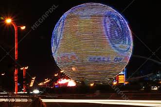 SM Mall of Asia (MOA) Globe and blurry night traffic lights