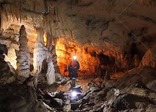 Speleologist exploring the cave