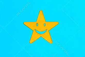 yellow smiling star on blue background, creative art modern design