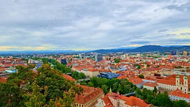 Cityscape of Graz and the Clock Tower (Grazer Uhrturm), famous tourist attraction in Graz, Steiermark, Austria, in 4k