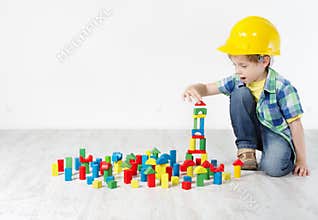 Kids Play Room, Child in Hard Hat Playing Building Blocks Toys