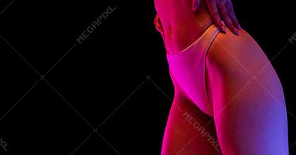 Flyer with closeup shot of female body in underwear, lingerie on dark background in purple neon light. Fitness, body