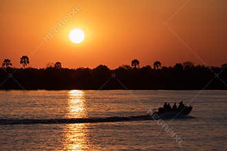 Sunset over the Zambezi River next to Victoria Falls, on the border between Zambia and Zimbabwe.