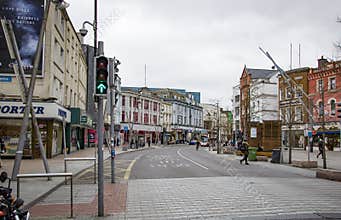 CORK, IRELAND. APRIL 04, 2022. St. Patrick Street. Old city center. Shops and restaurants