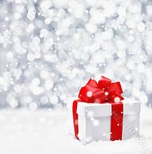 Festive Christmas gift in snow