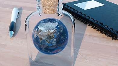 Rotating Earth globe inside glass bottle. Design. Surreal illustration of the planet on the table, notebook and a pen.
