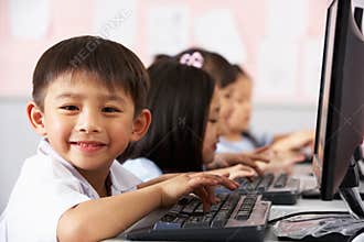 Pupil Using Keyboard During Computer Class