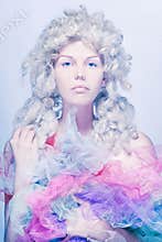 A doll or a princess. Cold tones photo.