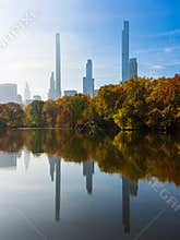 New York City\'s Billionaire Row Reflects of the lake in Central Park