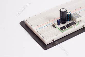 Electrical circuit on breadboard on isolated white