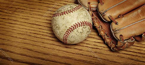Baseball Mitt and Ball on Old Wood America's Past Time