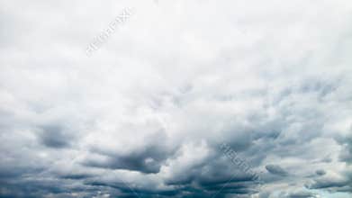 Storm clouds give way to white and blue skies, time-lapse