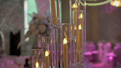 Served tables for a holiday in a restaurant. Glasses, plates, cutlery, napkins.