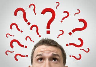 Man thinking concept with question marks