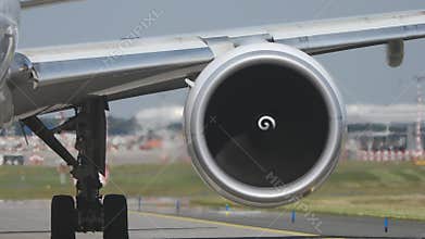 Hot air behind jet engine of plane at airport