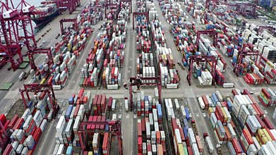container cargo ship in export and import business and logistics international goods in urban city