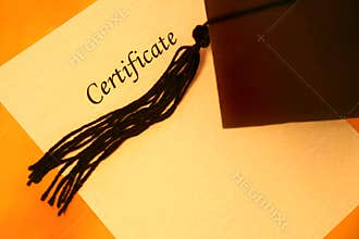Certificate and graduation cap