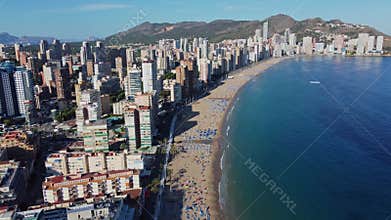 4K Drone Footage. Benidorm. Aerial View beach, building. Spain. Costa Blanca. 10 June 2023