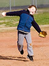 Boy throwing baseball