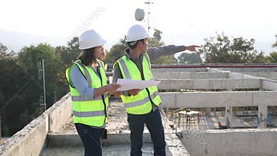 Male and female civil engineers Inspect and analyze projects under construction. Engineering and architectural concepts