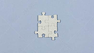 Puzzle being connected together.