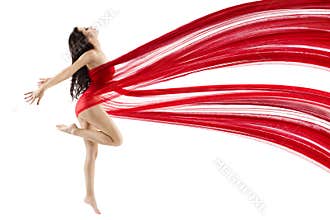 Woman dancing with red flying waving chiffon cloth