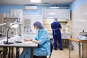 Researchers conduct research in the laboratory. Biolaboratory