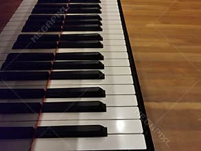Piano keyboard and black stripe with copy space. music writing background concept