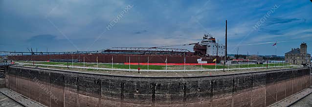 Panorama of Paul r tregurgha navigates the soo locks