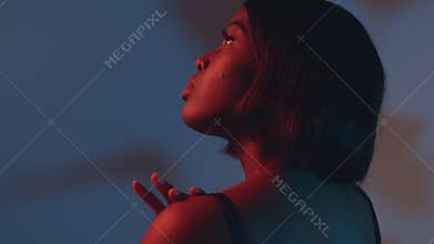 Young pretty sensual african american girl stroking dark skin her hand, shoulder. Skincare, bodycare, self-love. ProRes