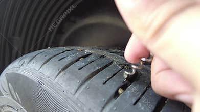 Removing Small Stone From Tires with Tools