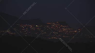 Night town lights on the mountain in Spain