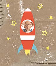 Art collage with cute school age wondered boy inside drawn rocket ship isolated on grey background. Childhood, dreams
