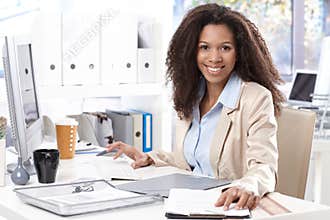 Portrait of beautiful smiling office worker