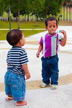 Adorable kids play bubbles